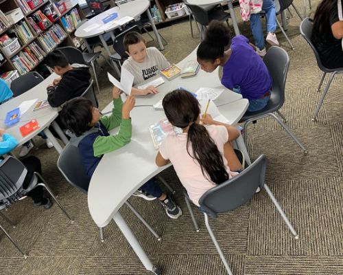  A picture of students working together in the library