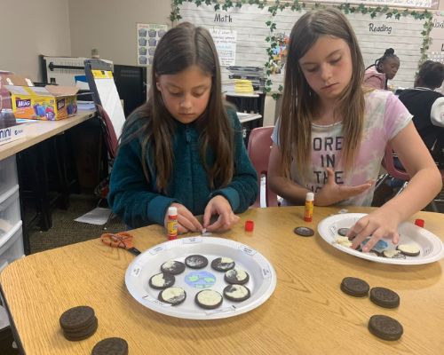  Two HWES students working on there moon phases