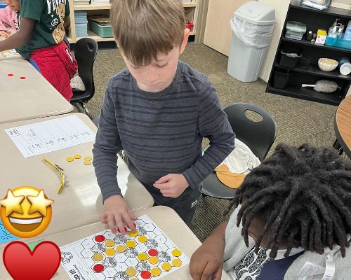  Two students working on math facts